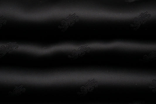 Tissu jacquard - motif lion - noir