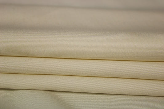 Tissu crêpe de laine stretch - ivoire - photo 2/3 | So Tissus