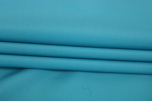 Tissu crepe stretch - turquoise - photo 2/4 | So Tissus