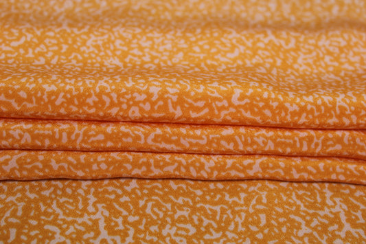 Tissu crêpe de chine 100% soie - imprimé tacheté - orange et blanc - photo 2/5 | So Tissus