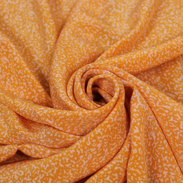 Tissu crêpe de chine 100% soie - imprimé tacheté - orange et blanc