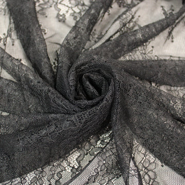 Tissu dentelle - motif fleuri - noir