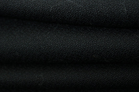 Tissu crêpe de laine - noir - photo 2/4 | So Tissus