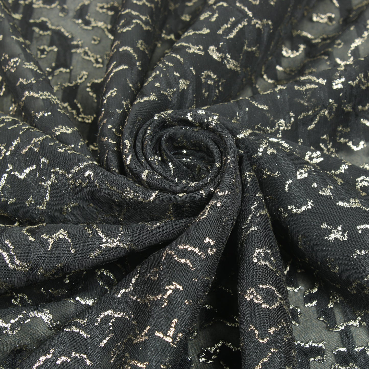 Tissu dévoré - motif tacheté - noir et doré - photo 1/5 | So Tissus