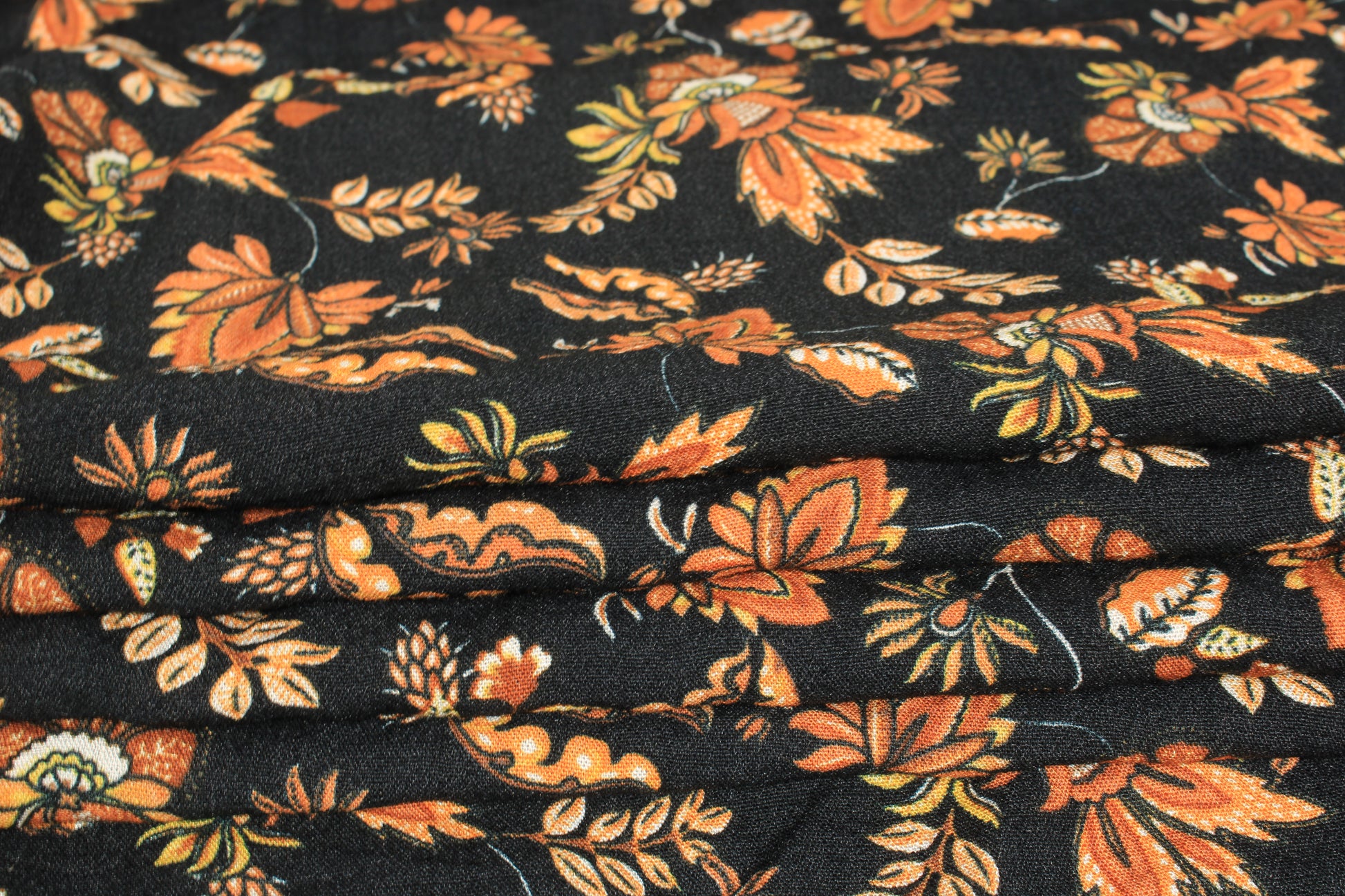 Tissu crêpe viscose - imprimé fleuri - ton orange - photo 2/5 | So Tissus