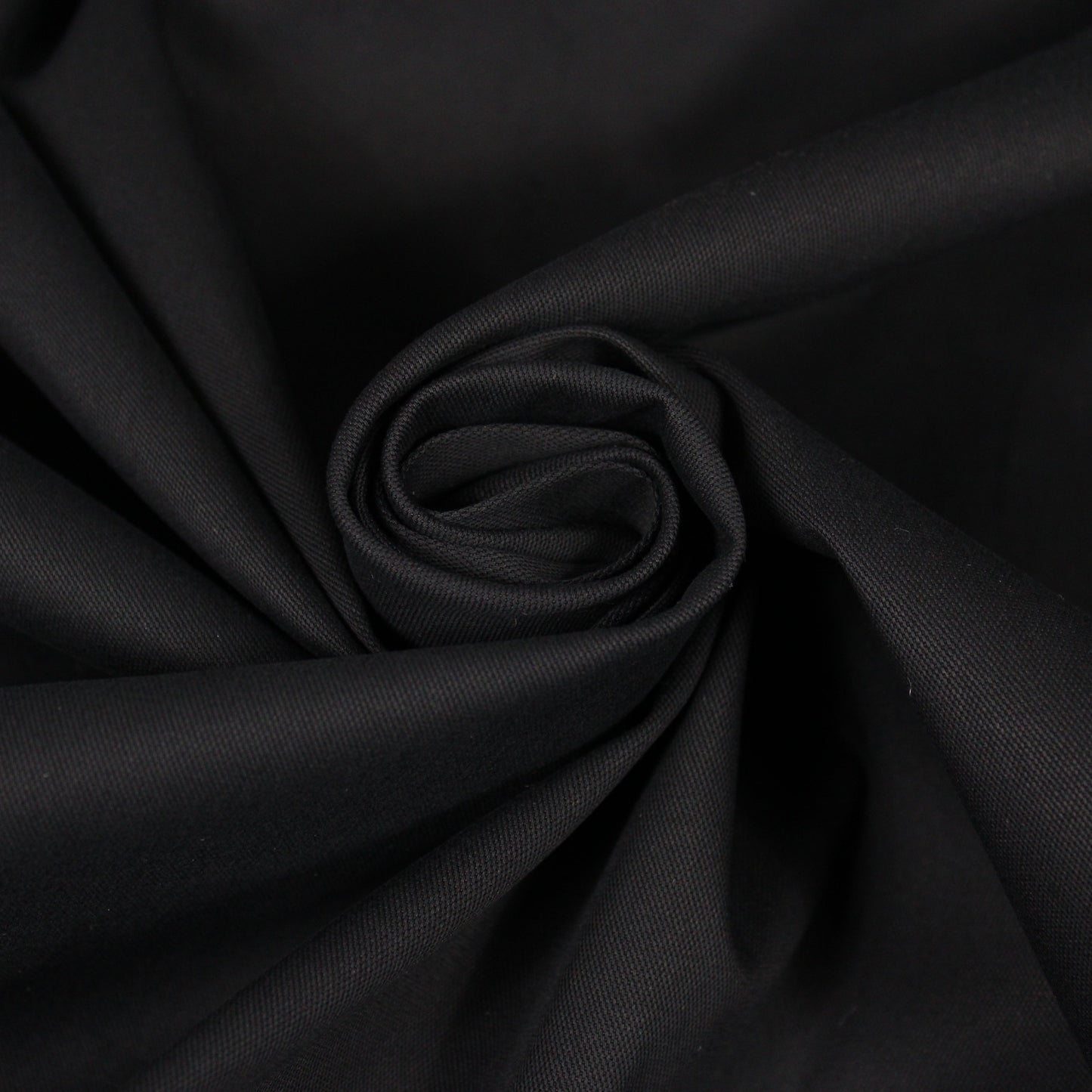 Tissu gabardine de coton stretch - noir - photo 1/4 | So Tissus