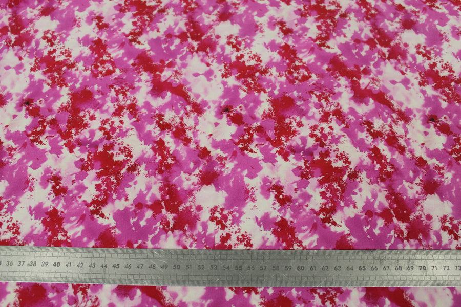 Tissu crêpe de chine 100% soie - imprimé tacheté - ton rose et rouge