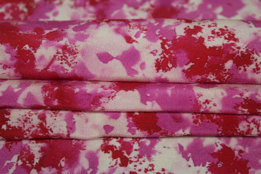 Tissu crêpe de chine 100% soie - imprimé tacheté - ton rose et rouge