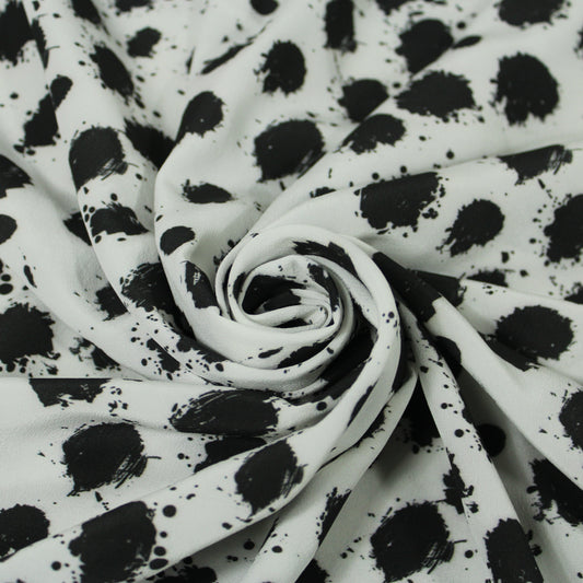 Tissu crêpe de chine 100% soie - imprimé à pois tacheté - noir et blanc - photo 1/5 | So Tissus