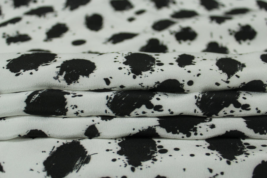 Tissu crêpe de chine 100% soie - imprimé à pois tacheté - noir et blanc