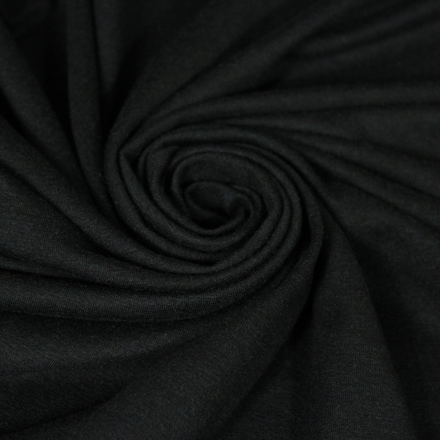 Tissu jersey de laine - noir - photo 1/4 | So Tissus