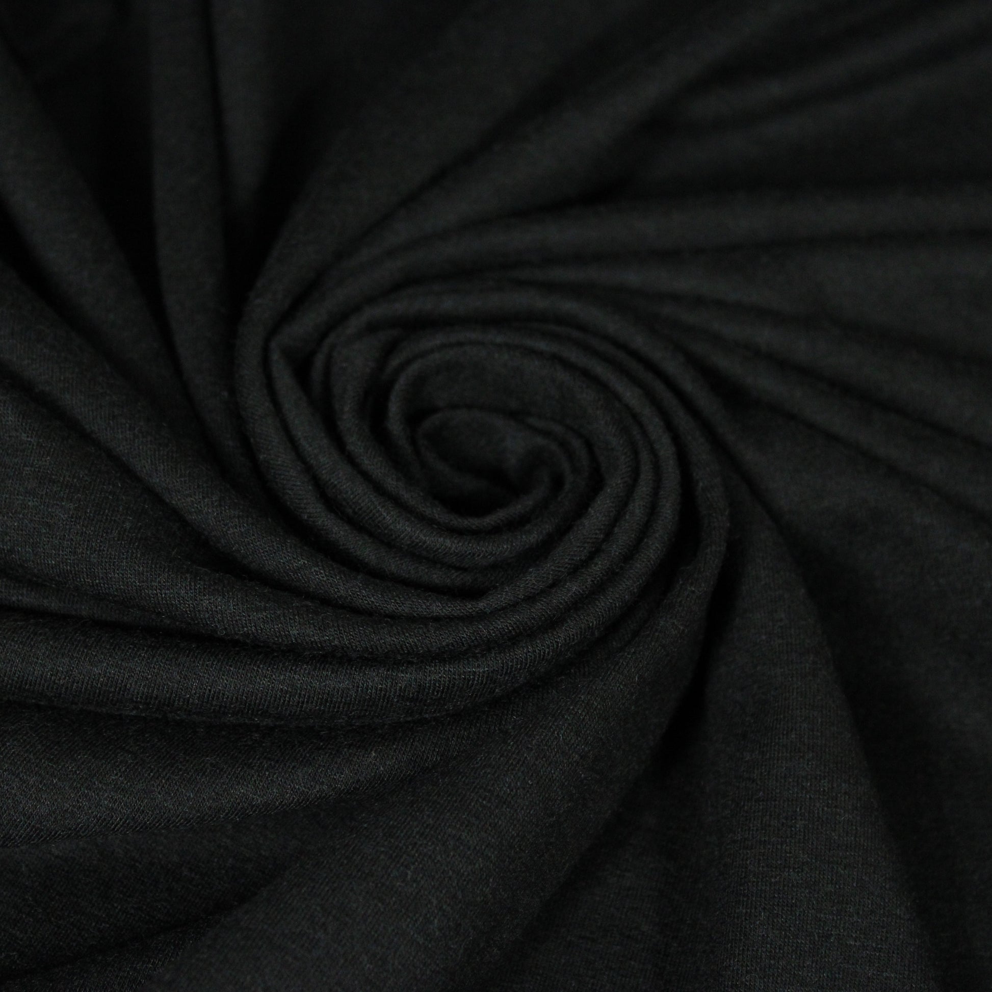 Tissu jersey de laine - noir - photo 1/4 | So Tissus