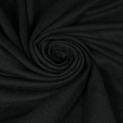 Tissu jersey de laine - noir - photo 1/4 | So Tissus