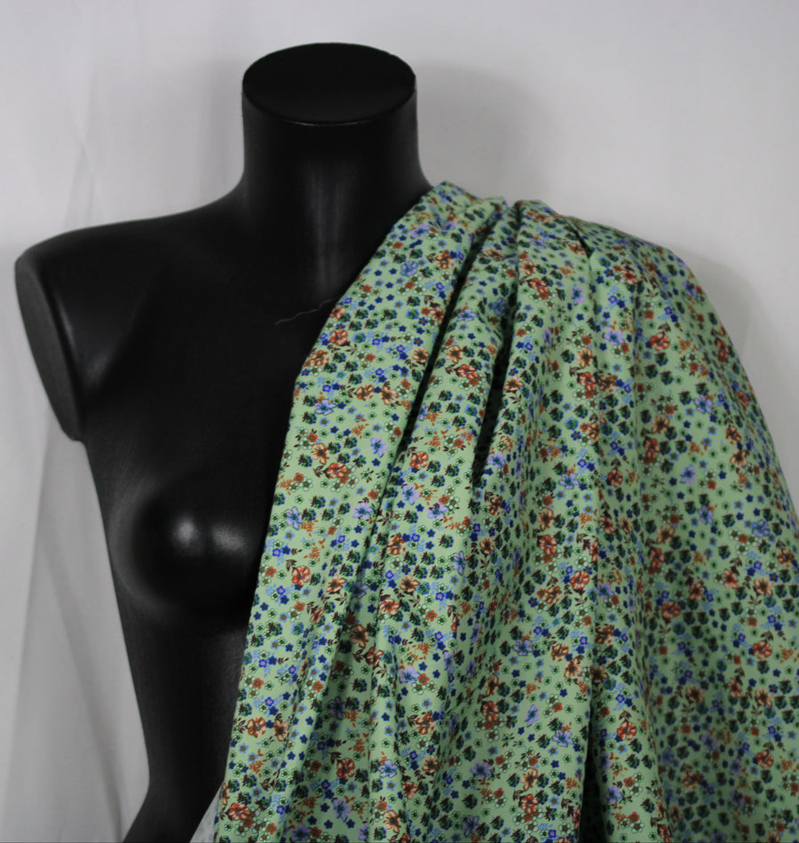 Tissu technique imperméable - imprimé fleuri - ton vert d'eau