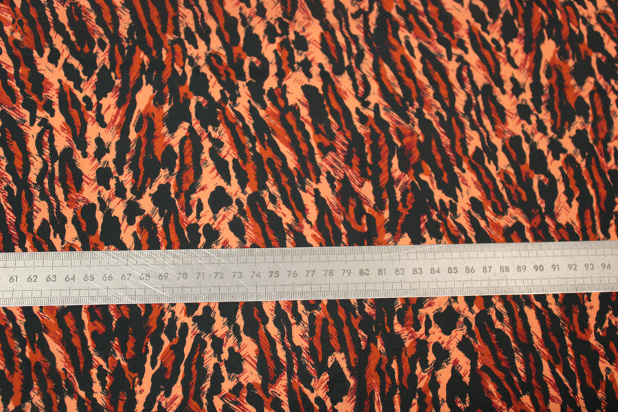 Tissu viscose - petit imprimé leopard - ton orange