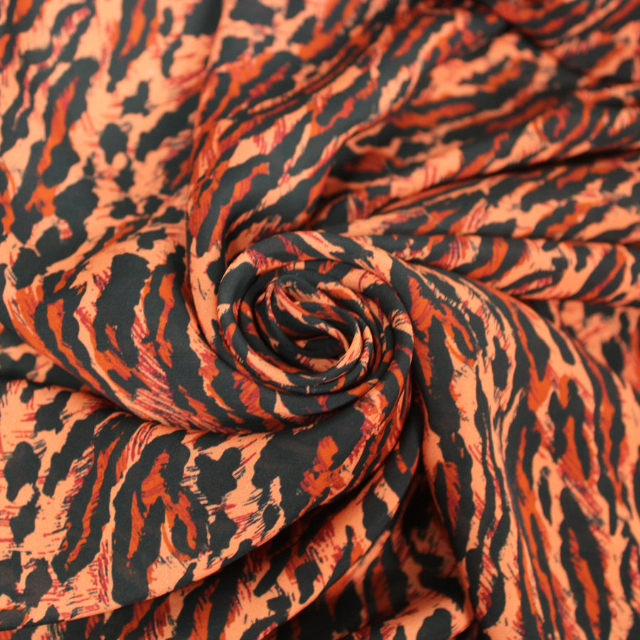 Tissu viscose - petit imprimé leopard - ton orange