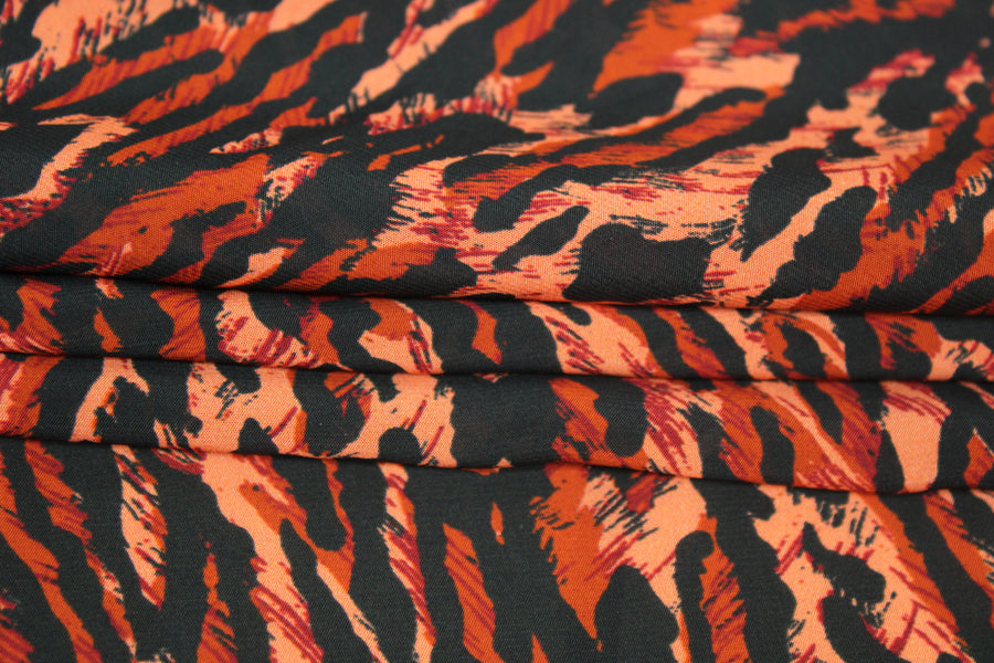 Tissu viscose - petit imprimé leopard - ton orange