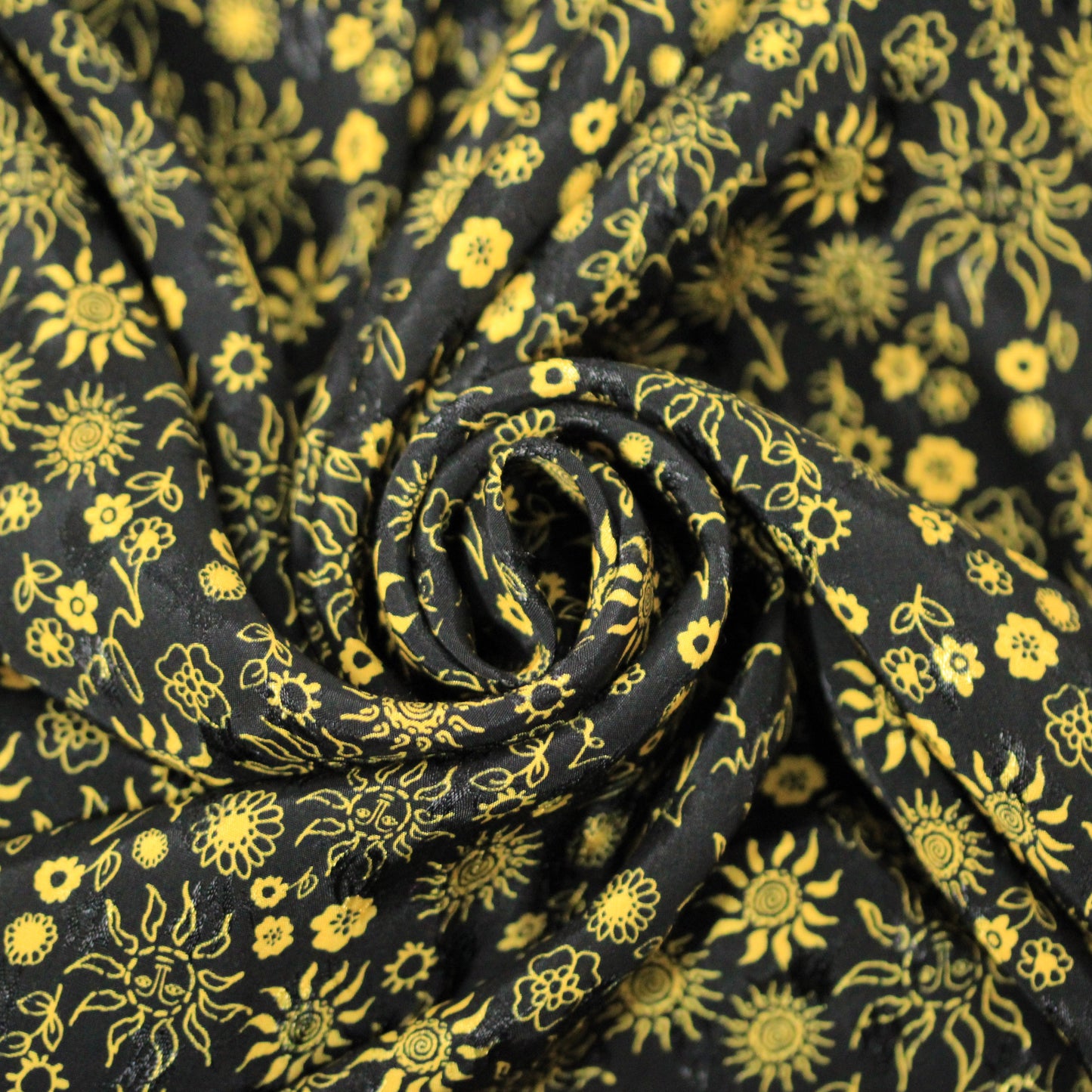 Tissu viscose - imprimé fleuri et soleil  - jaune et noir - photo 1/5 | So Tissus