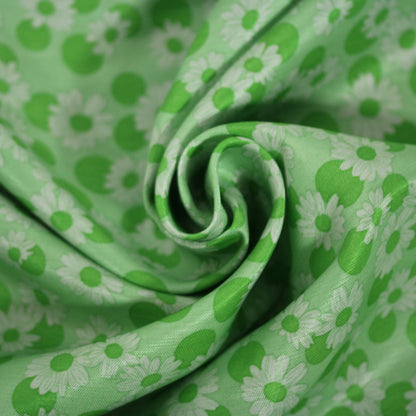 Tissu soie - imprimé marguerite - ton vert pomme - photo 1/4 | So Tissus