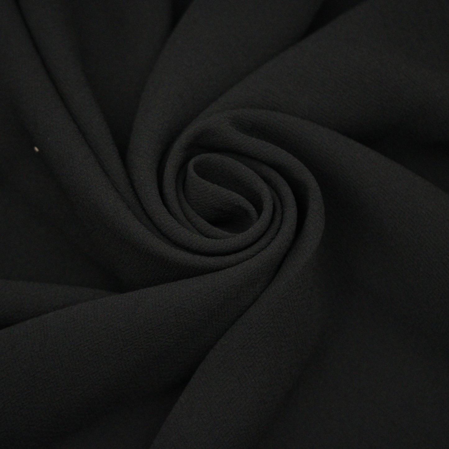 Tissu crêpe texturé - noir - photo 1/4 | So Tissus