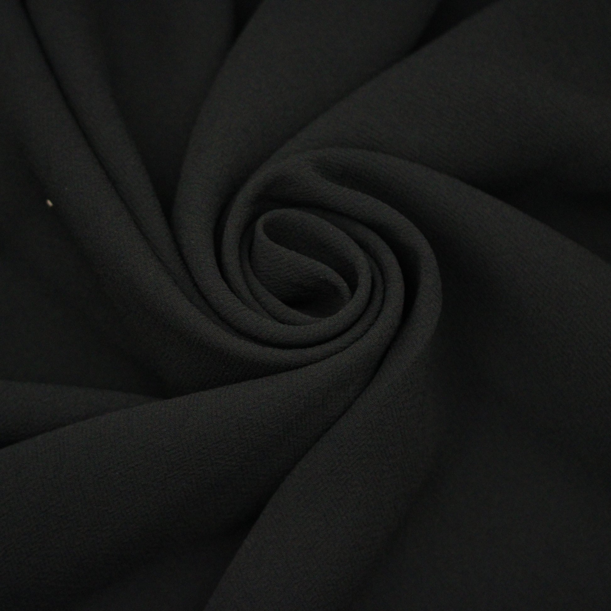Tissu crêpe texturé - noir - photo 1/4 | So Tissus