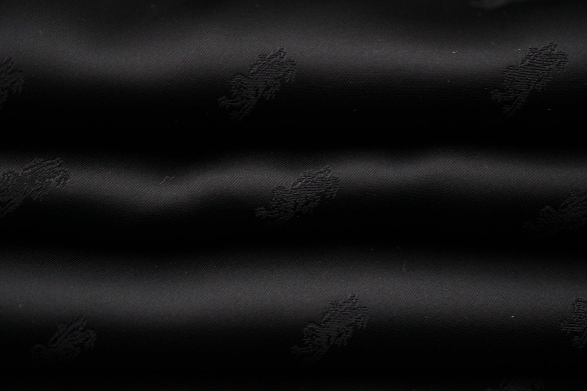 Tissu jacquard - motif lion - noir