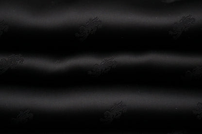 Tissu jacquard - motif lion - noir