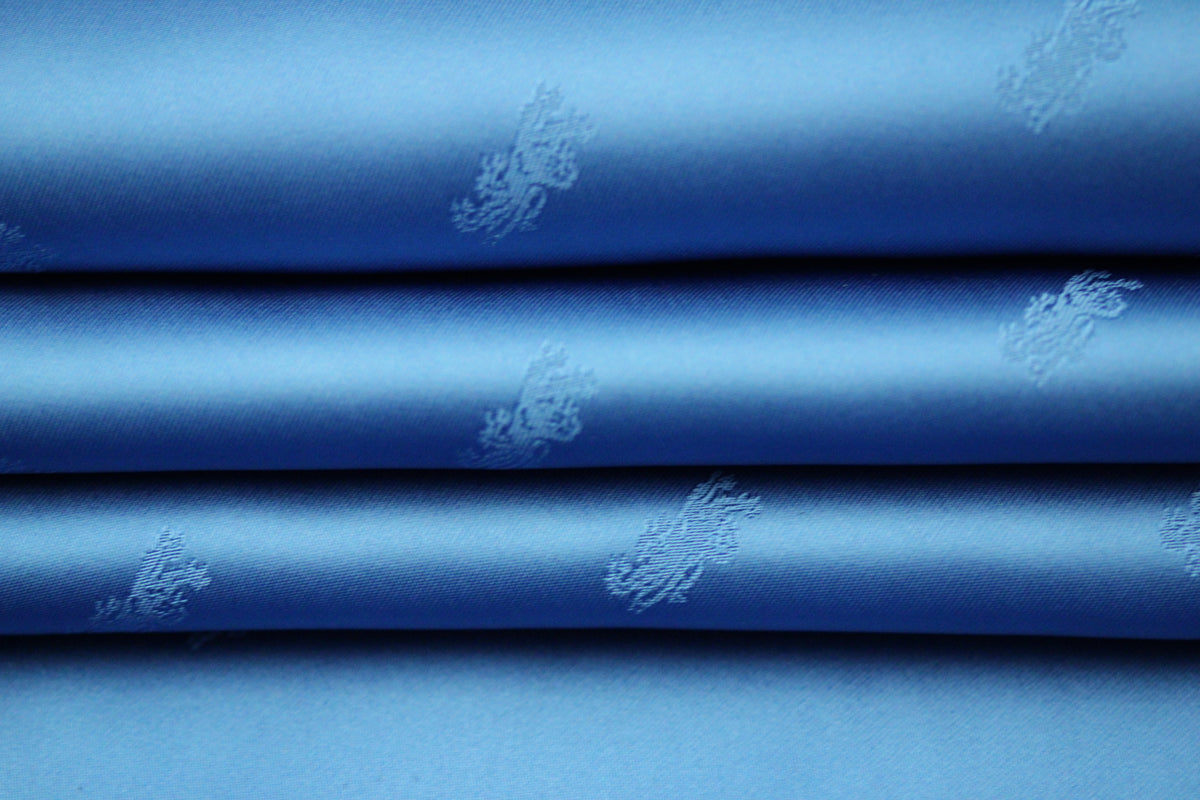 Tissu jacquard - motif lion - bleu