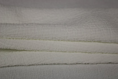 Tissu crêpe stretch gaufré - blanc - photo 2/3 | So Tissus