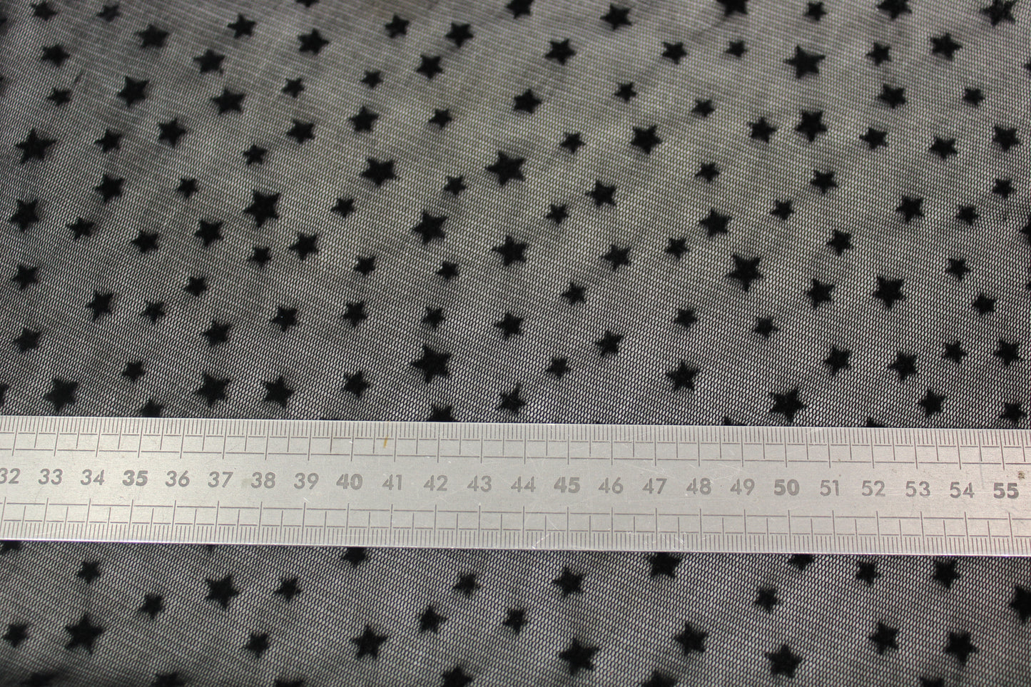 Tissu maille résille motif étoile - noir - photo 5/6 | So Tissus