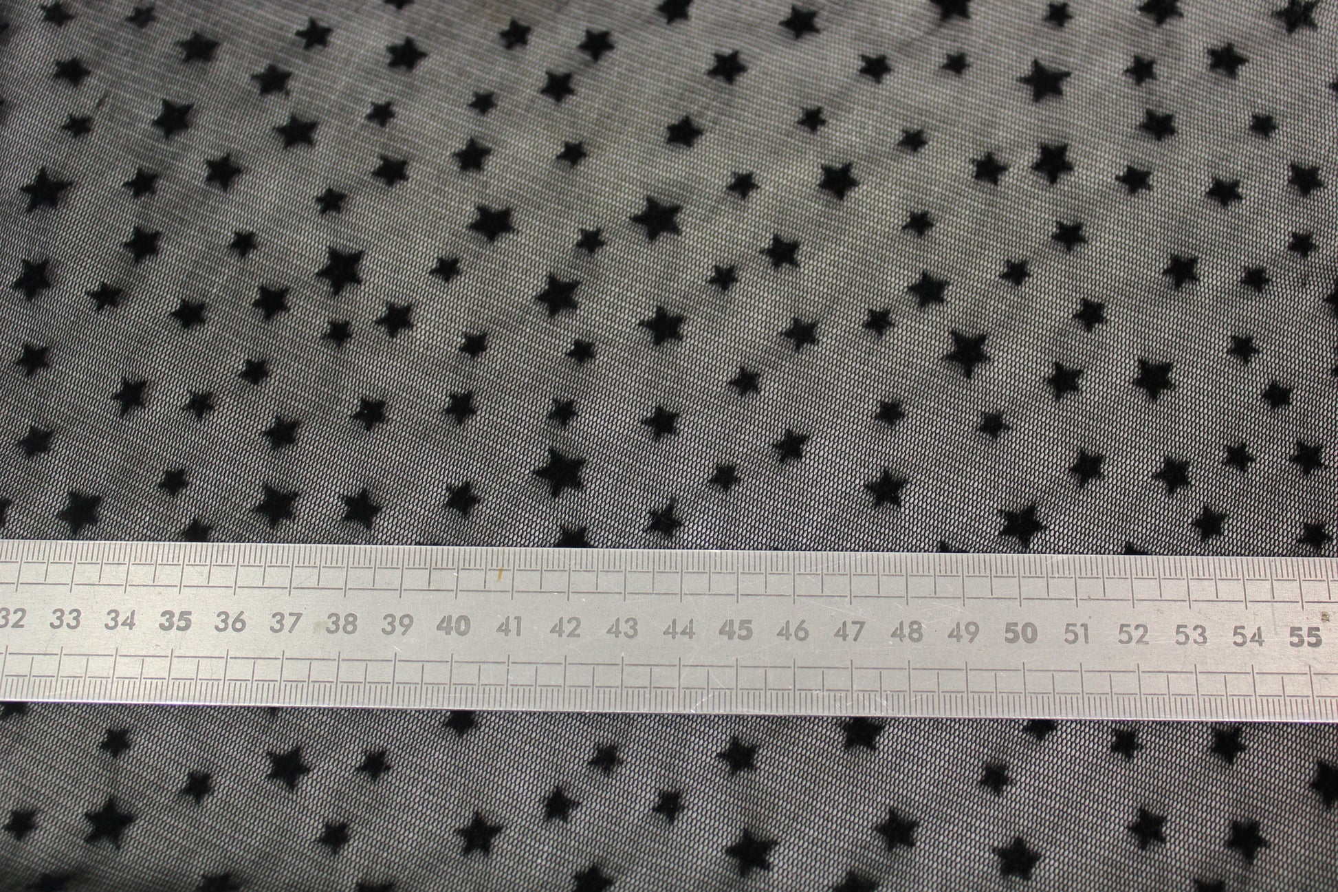 Tissu maille résille motif étoile - noir - photo 5/6 | So Tissus