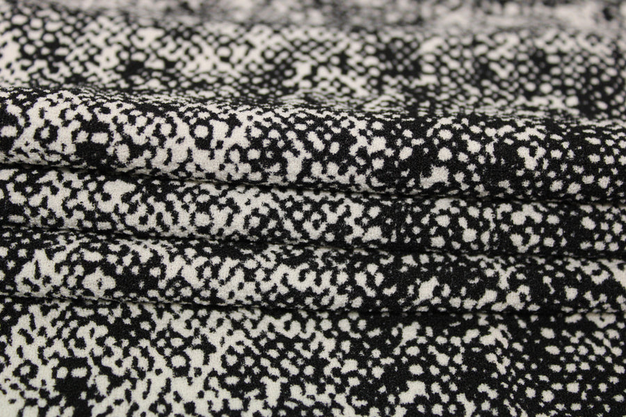 Tissu crêpe texturé - imprimé tacheté - noir et blanc