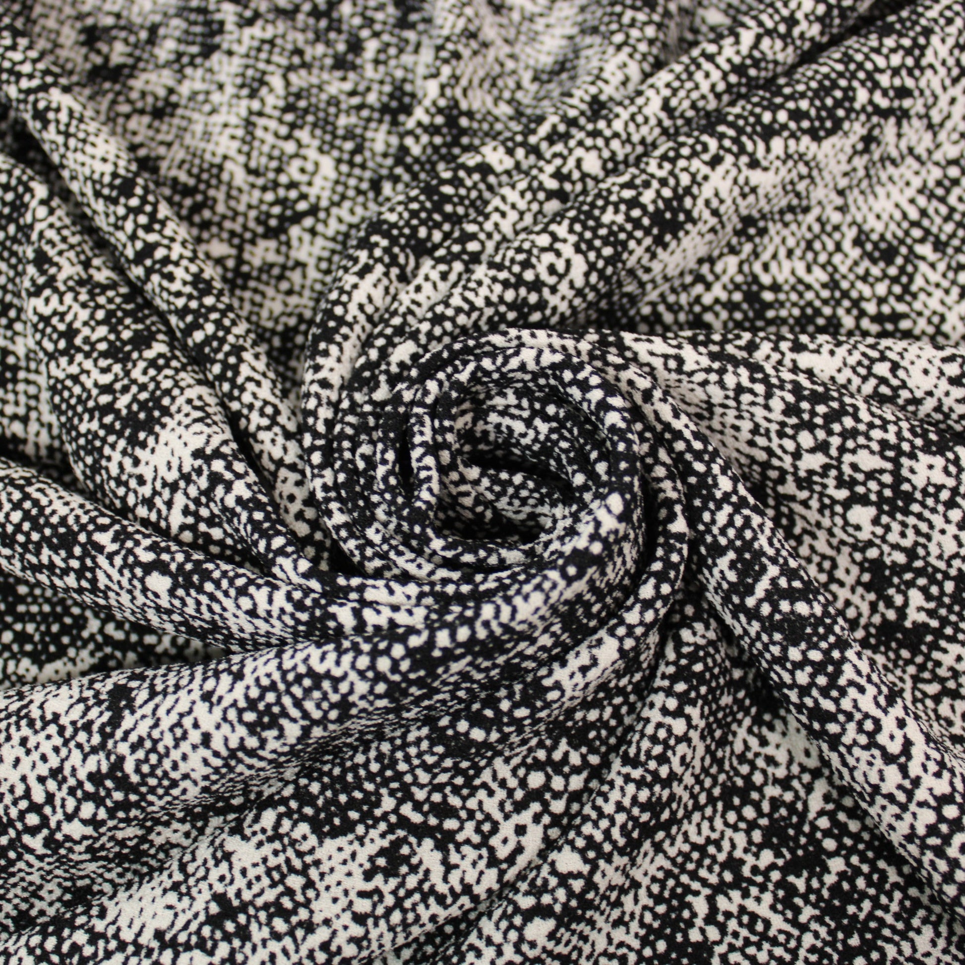 Tissu crêpe texturé - imprimé tacheté - noir et blanc - photo 1/3 | So Tissus