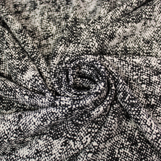 Tissu crêpe texturé - imprimé tacheté - noir et blanc - photo 1/3 | So Tissus