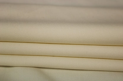 Tissu crêpe de laine stretch - ivoire - photo 2/3 | So Tissus
