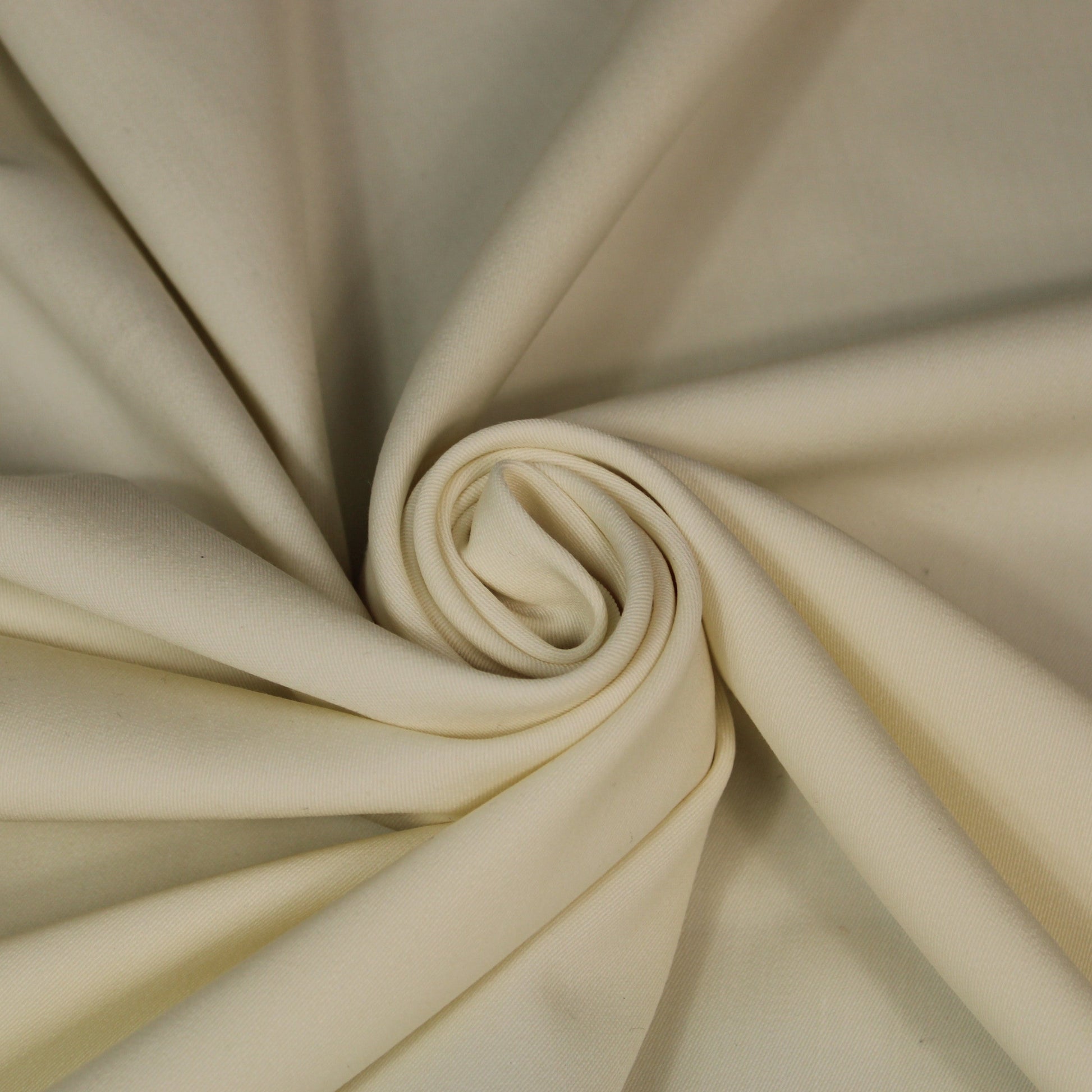 Tissu crêpe de laine stretch - ivoire - photo 1/3 | So Tissus