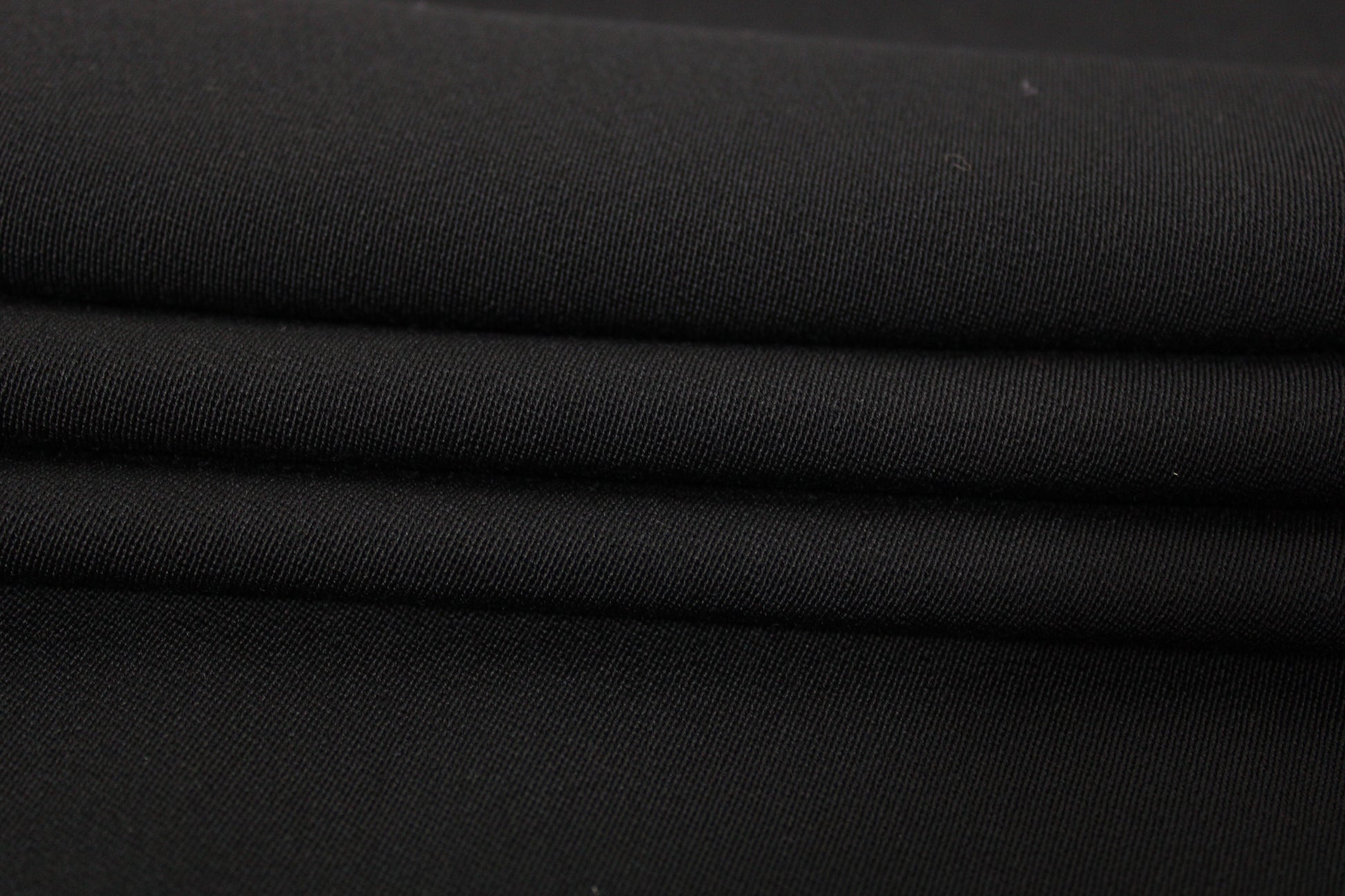Tissu crêpe de laine stretch - noir - photo 2/3 | So Tissus