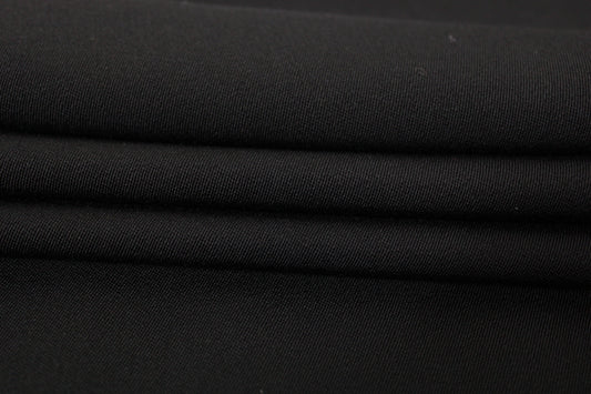 Tissu crêpe de laine stretch - noir - photo 2/3 | So Tissus