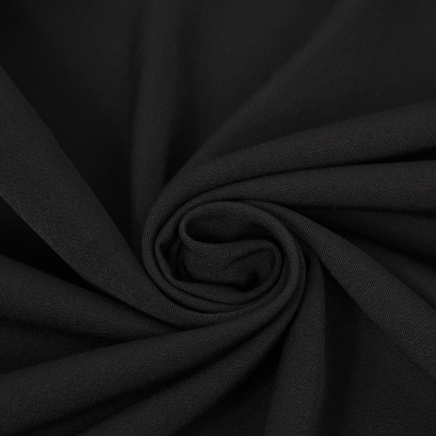 Tissu crêpe de laine stretch - noir - photo 1/3 | So Tissus