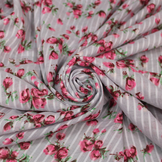 Tissu voile de coton - imprimé fleurs roses - ton bleu ciel - photo 1/4 | So Tissus