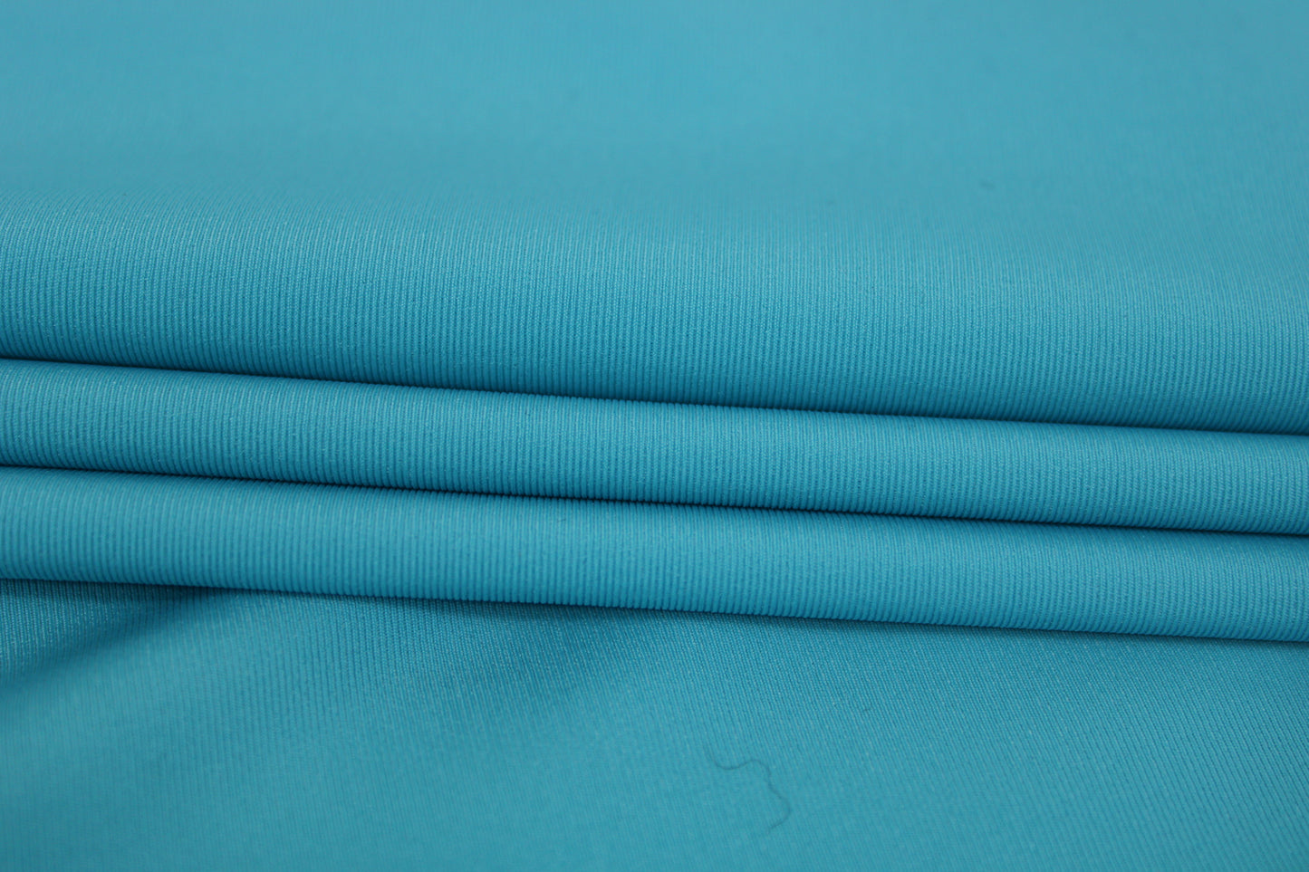 Tissu crepe stretch - turquoise - photo 2/4 | So Tissus
