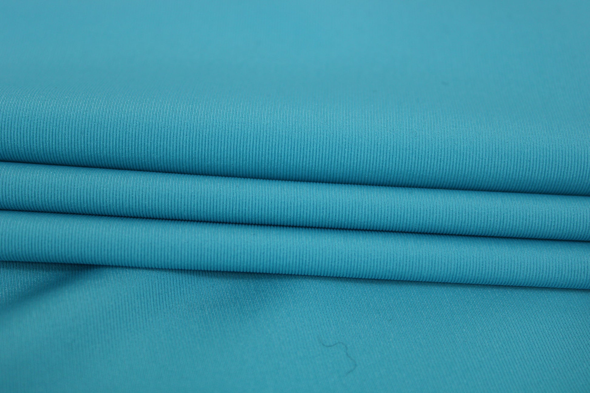 Tissu crepe stretch - turquoise - photo 2/4 | So Tissus