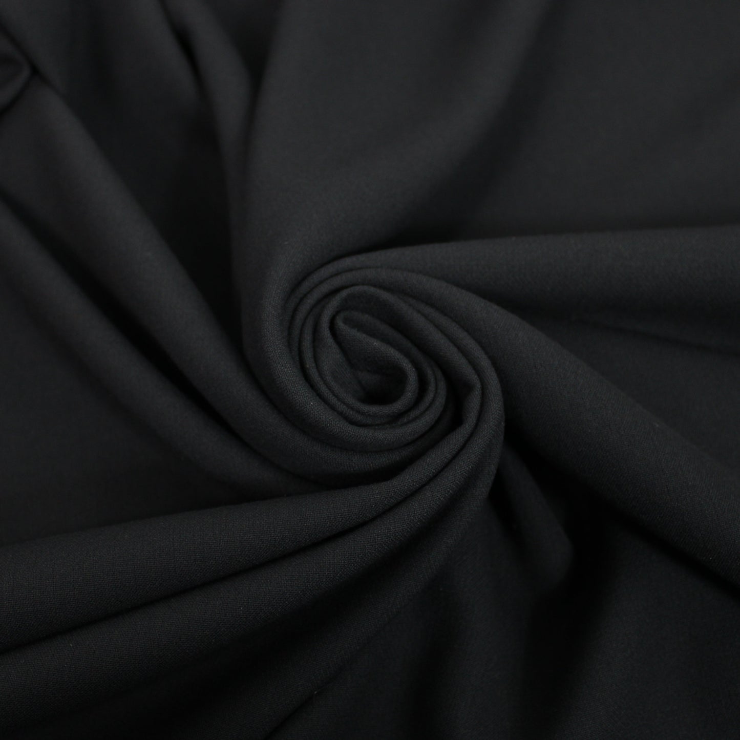 Tissu crêpe lourd - noir - photo 1/4 | So Tissus