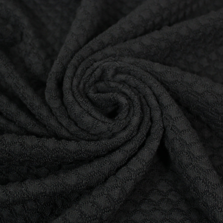 Tissu maille style tricot - motif losange - noir
