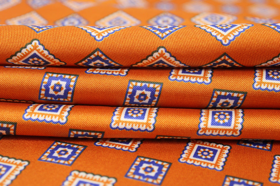 Tissu twill polyester - imprimé petit carré - orange et bleu