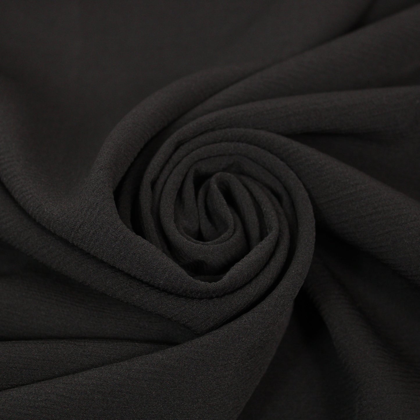 Tissu crêpe lourd texture - noir - photo 1/4 | So Tissus