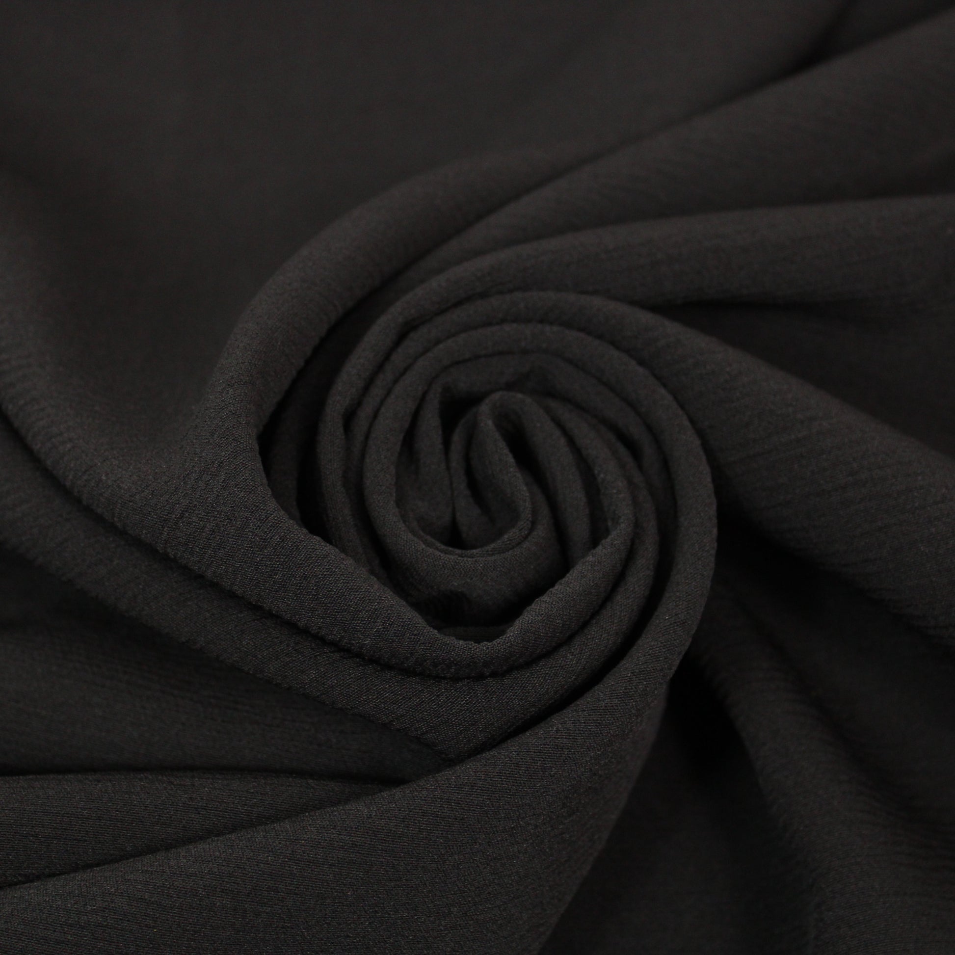 Tissu crêpe lourd texture - noir - photo 1/4 | So Tissus