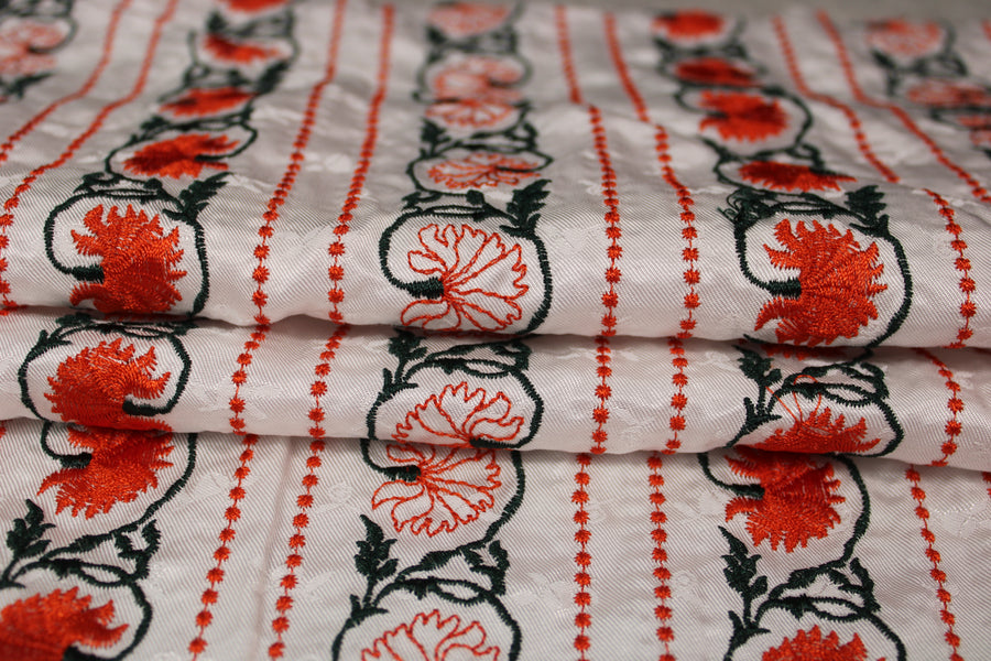 Tissu broderie - motif florale - orange et vert