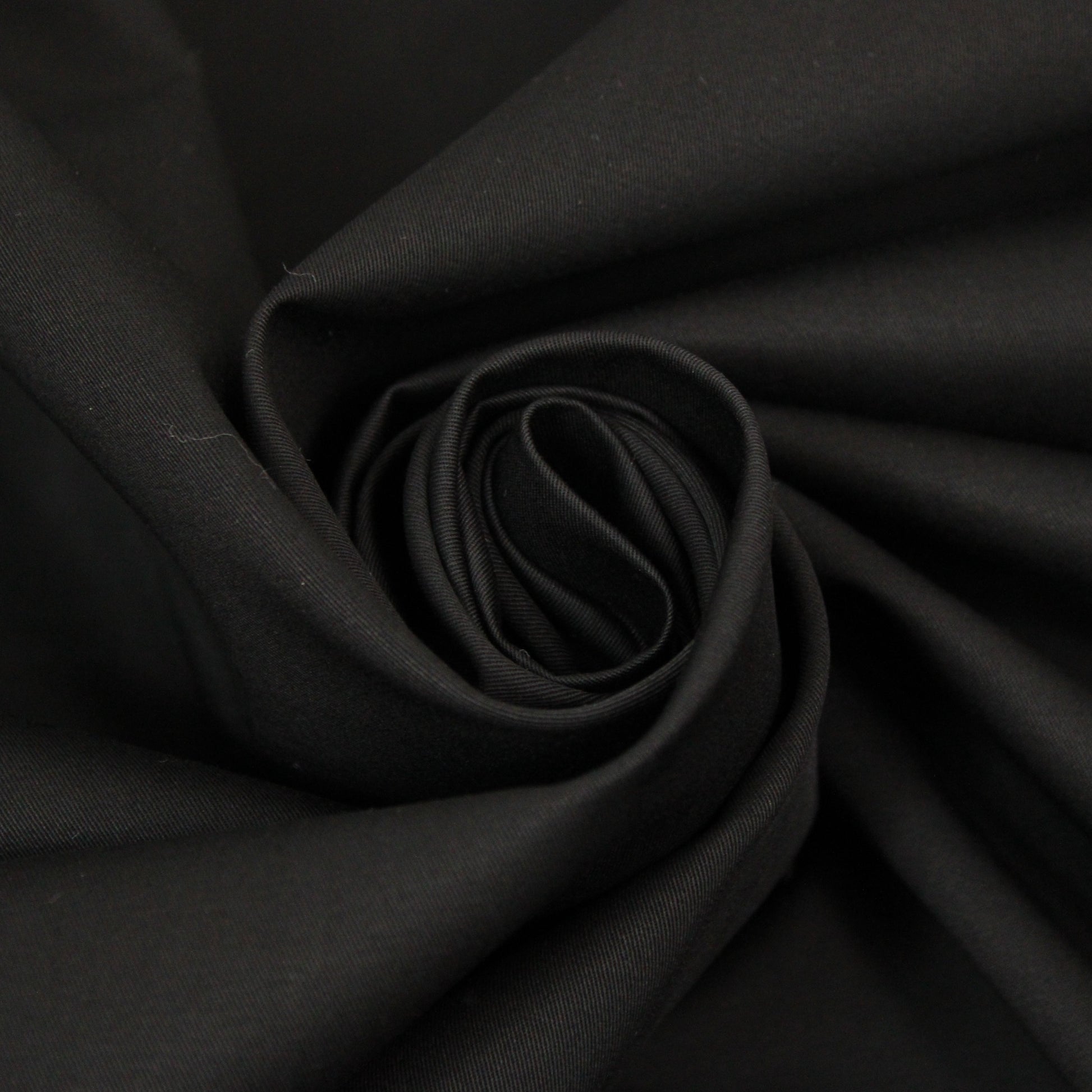 Tissu gabardine imperméable - noir - photo 1/4 | So Tissus