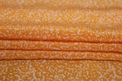 Tissu crêpe de chine 100% soie - imprimé tacheté - orange et blanc - photo 2/5 | So Tissus